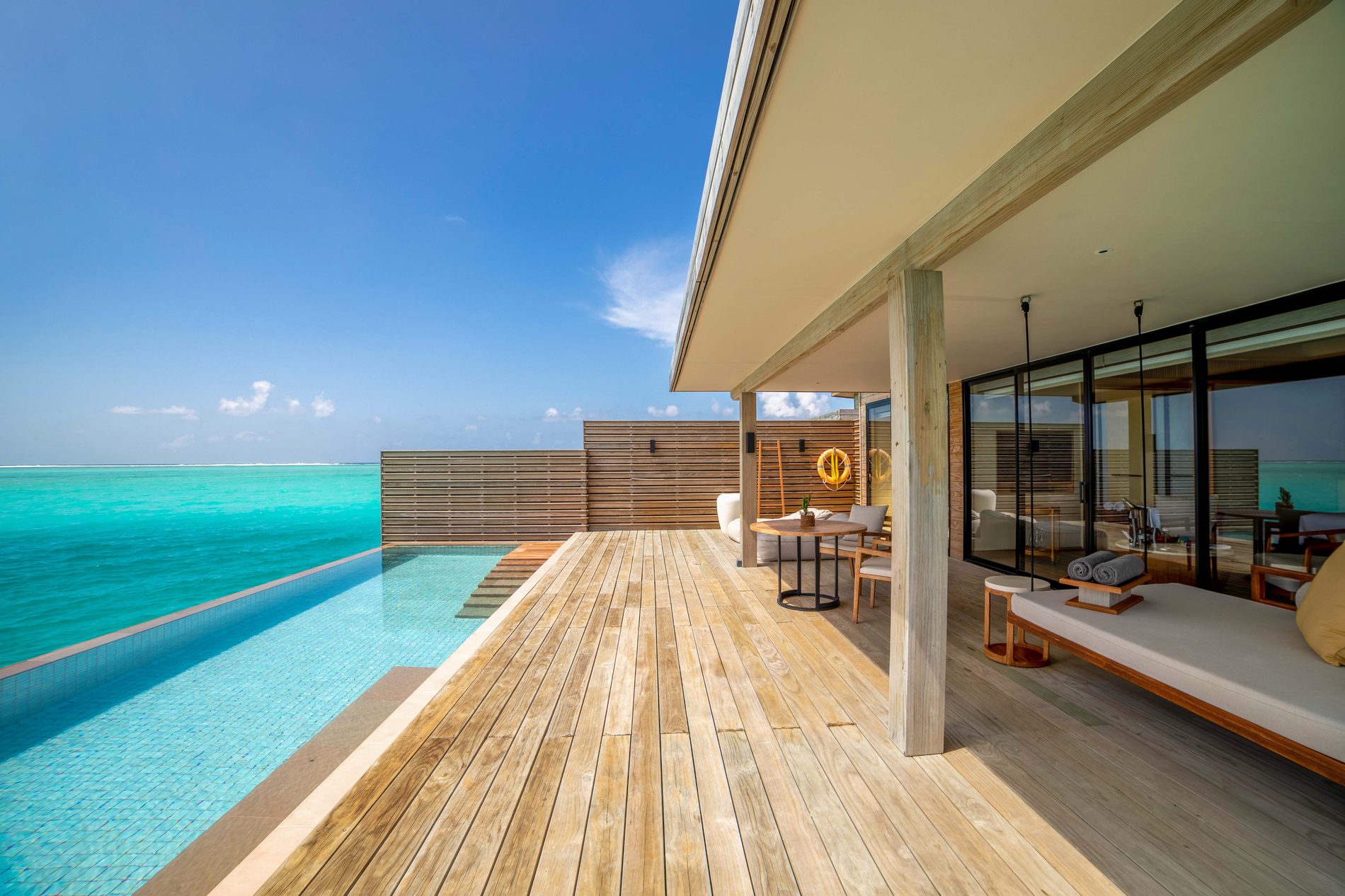 Water villa deck and pool over the lagoon, Kuda Villingili