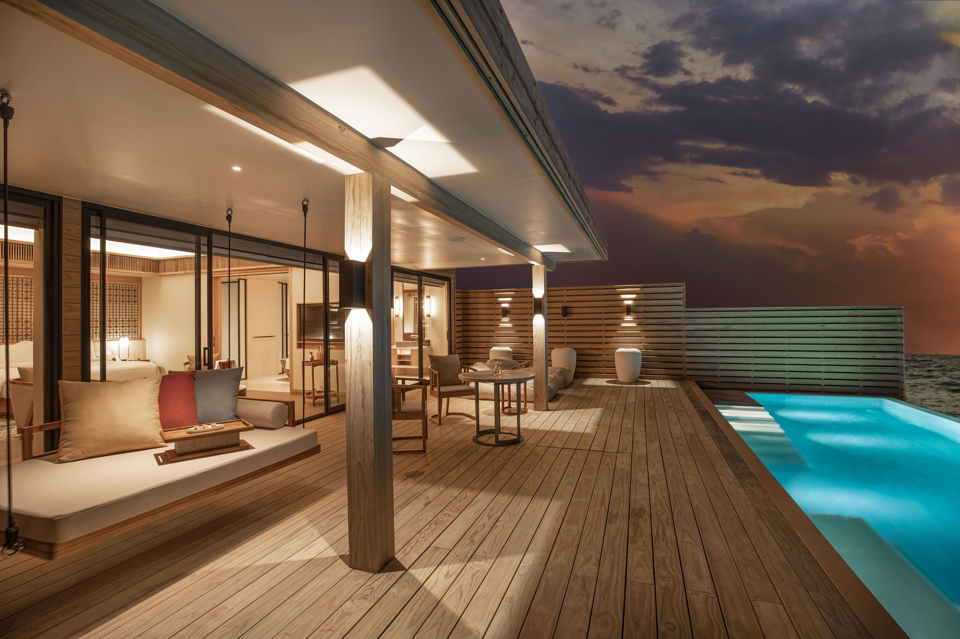 Water villa deck and private pool at sunset, Kuda Villingili