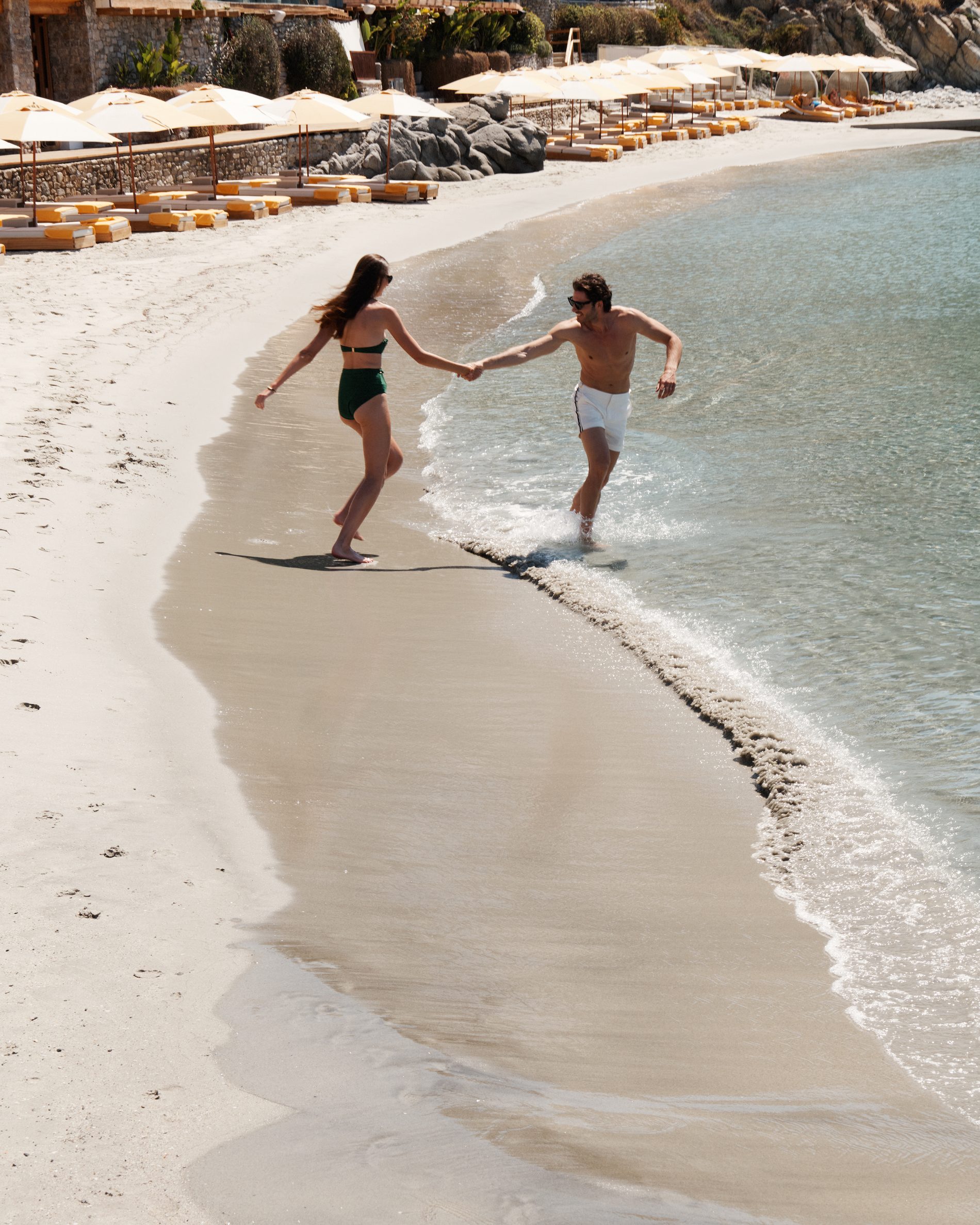 Couple on the private beach, Santa Marina Mykonos